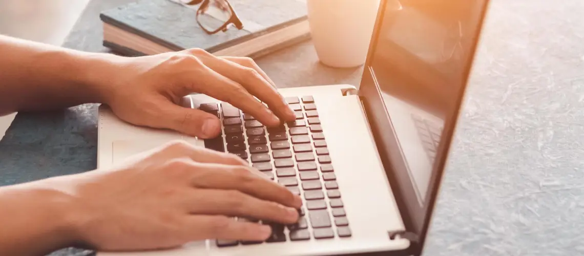 A doctor writing a prescription for medical plant-based therapy